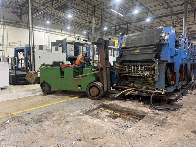 forklift with printing press section