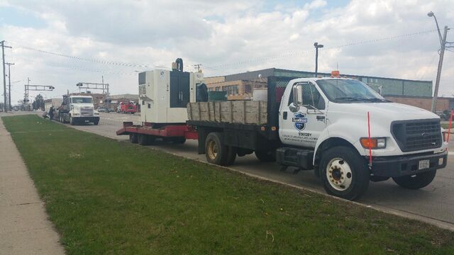 CNC machining center delivered on our flatbed truck