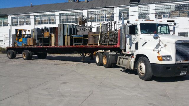 A full plant-cleanout load leaving on our flatbed semi