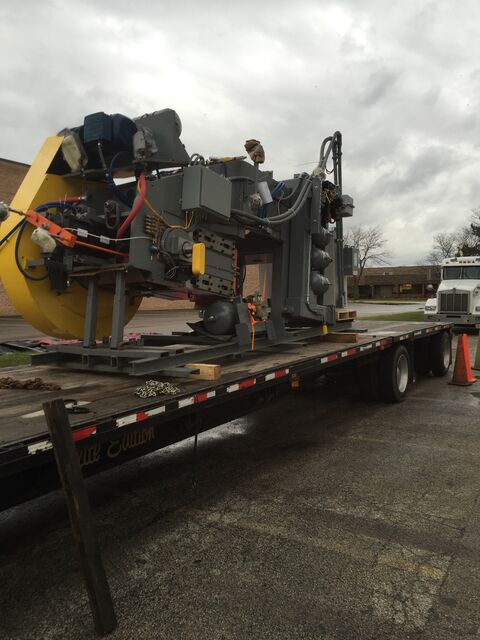 Factory-new machinery arriving on our flatbed trailer