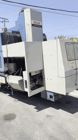 Video: carrying a Mazak machining center across the yard on our heavy forklift