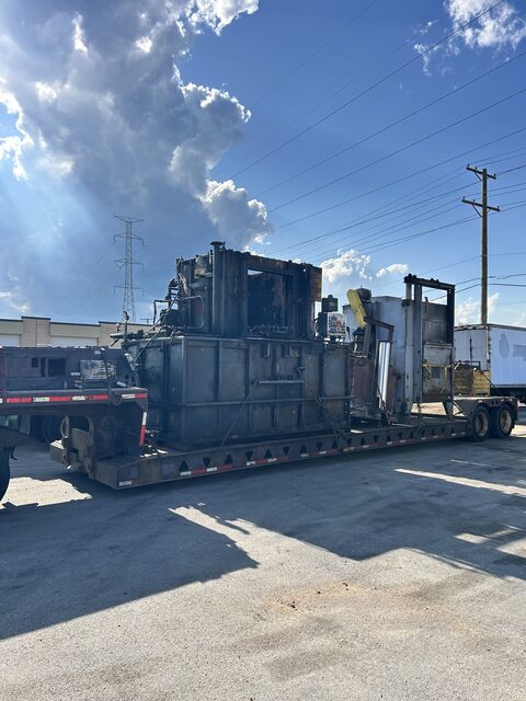 Heavy process equipment chained down on our lowboy, headed out of Schaumburg