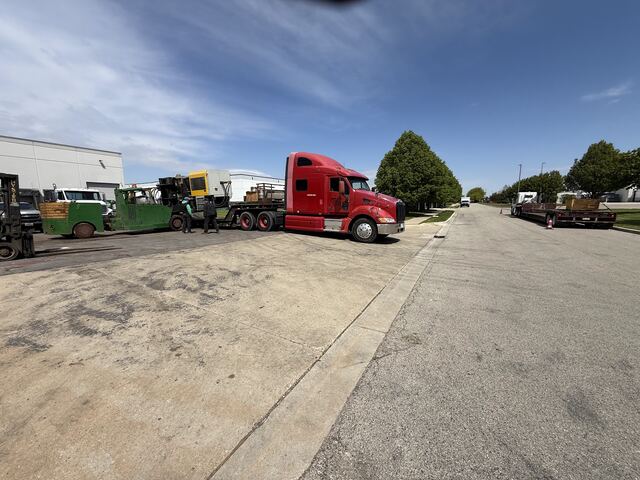 Our Versa-Lift walking a machine back across the lot to the waiting trailer